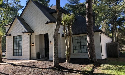 White Brick Painting with Black Trim