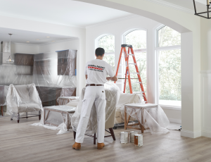  certapro painter preparing a room for interior painting