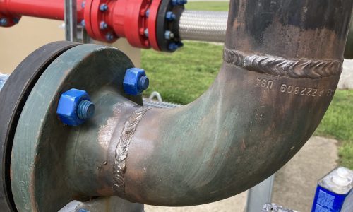 Faded Coating on Pipe