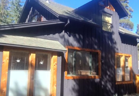 black painted cabin style house