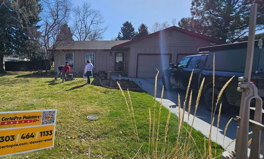 painters in front yard of house Preview Image 1