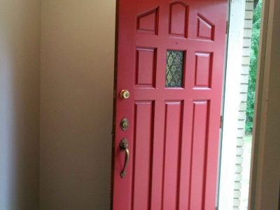 Door painting by CertaPro house painters in Washington Park, CO
