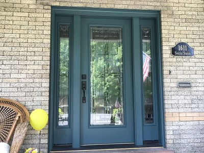 Door painting by CertaPro house painters in Denver Square