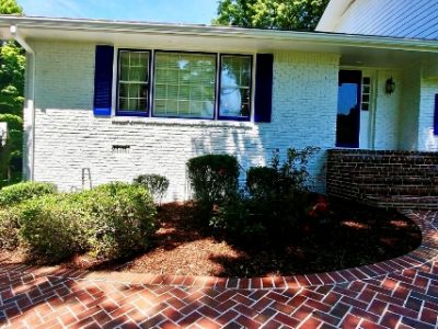 white brick house painted by certapro painters of dunwoody