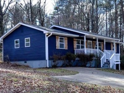 blue house was repainted by certapro painters of dunwoody