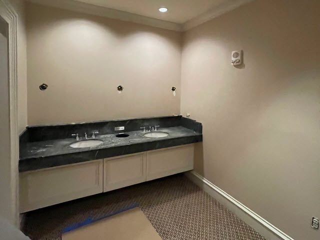 before photo of repainted commercial restroom Preview Image 5