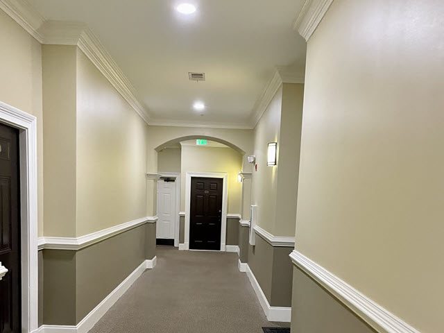 photo of condo hallway before being repainted Preview Image 3