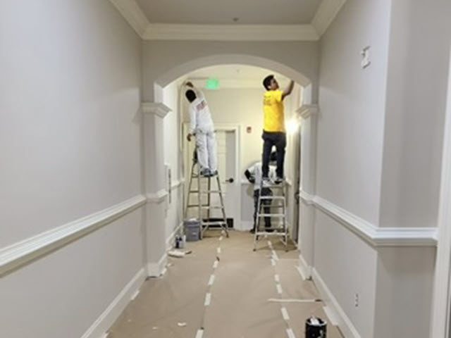 in progress photo of condo hallway being repainted Preview Image 4