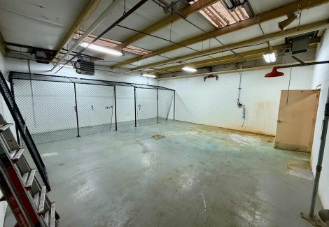 industrial floor with old coating and chemical stains