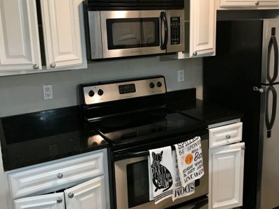 photo of repainted kitchen cabinets by certapro painters of dunwoody