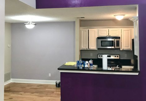 photo of repainted kitchen cabinets and purple accent wall by certapro painters of dunwoody