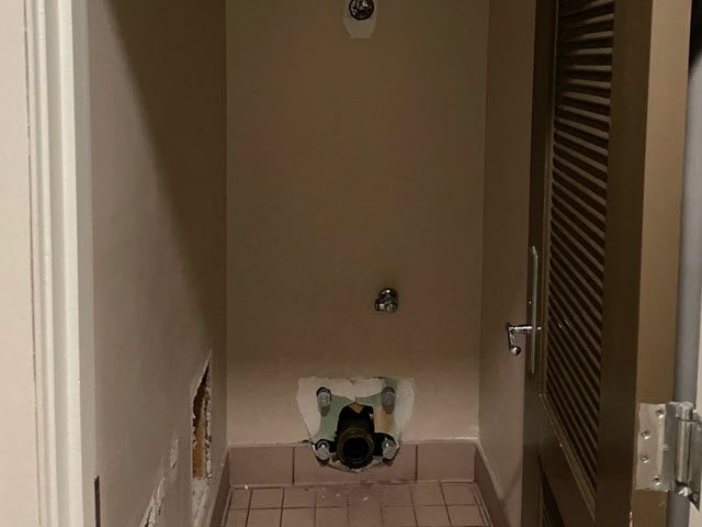 before photo of repainted commercial restroom Preview Image 2