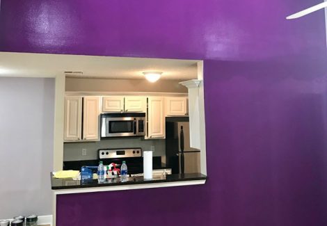 photo of repainted kitchen cabinets and purple accent wall by certapro painters of dunwoody