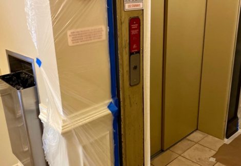 repainted elevator door trim in dunwoody - before