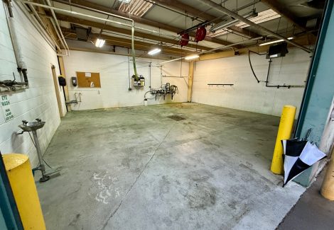 industrial floor with old coating and chemical stains