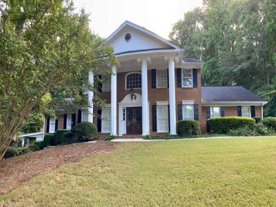 repainted brick exterior home in sandy springs ga - before photo