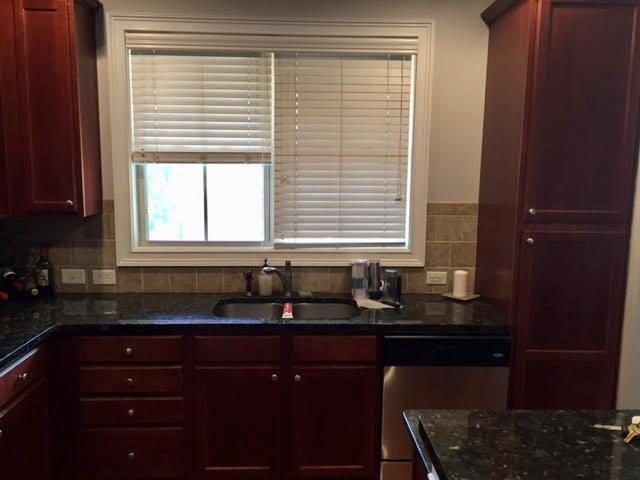 photos of kitchen cabinets before being repainted Preview Image 1