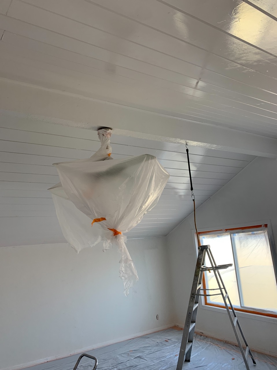 Preparing to paint an interior room in Scripps.