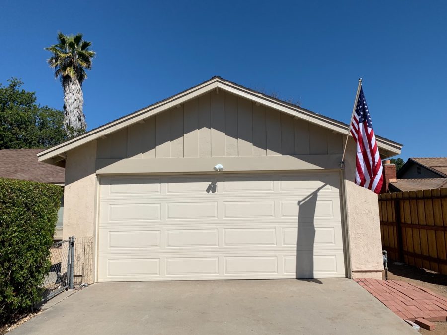 Garage after wood trim replacement and repainting. Preview Image 6