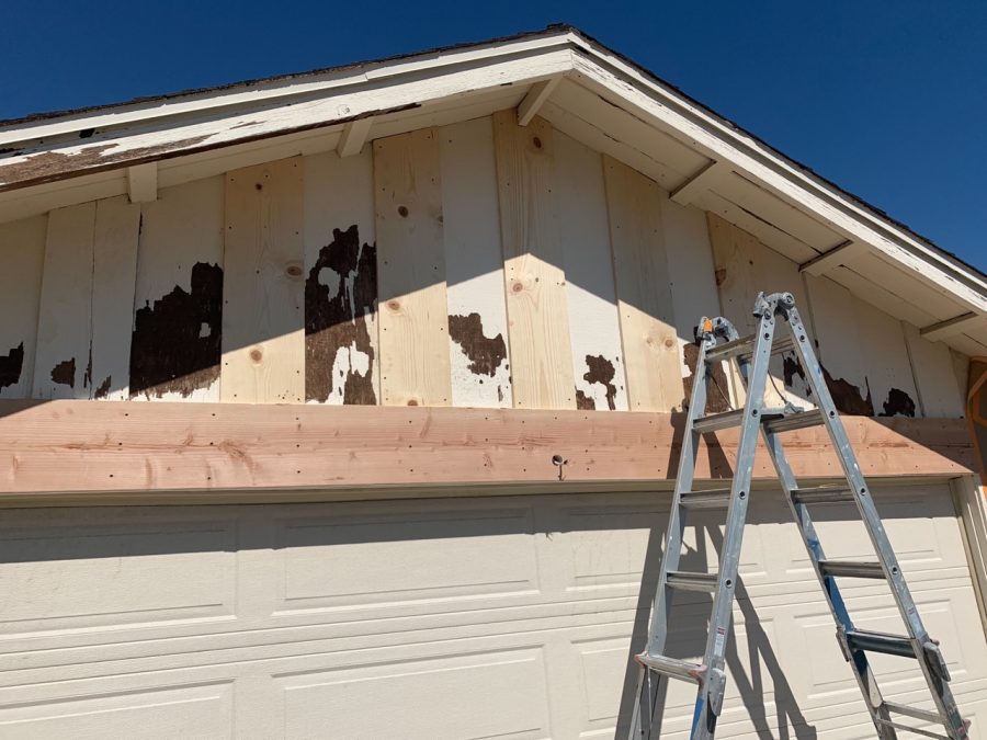 rotten wood on the garage being replaced. Preview Image 5
