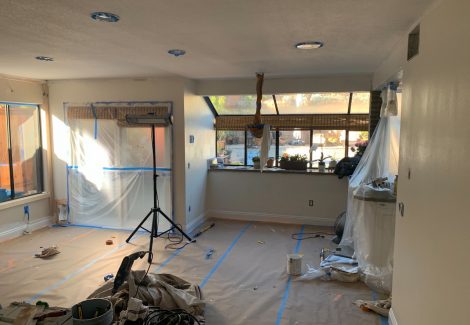 covering areas in plastic before painting.