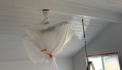 Preparing to paint an interior room in Scripps.