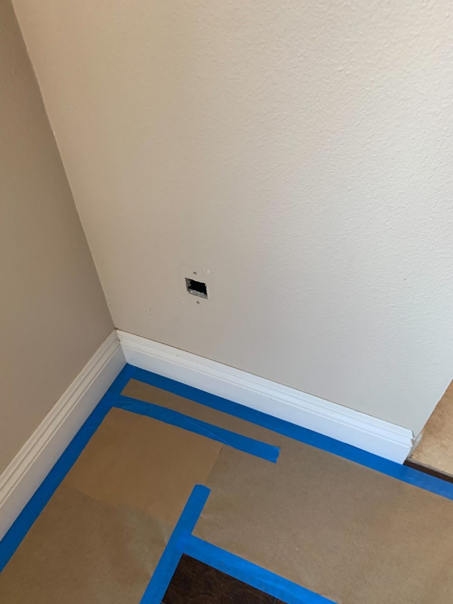 Protecting the floor before painting the walls. Preview Image 4