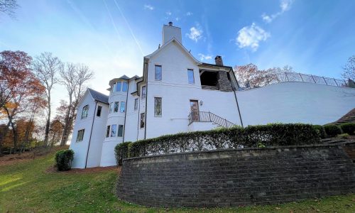 Side of Home & Retaining Wall - After
