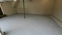 Our crew applied 1/4” Citadel Polyurea Chip System to the garage floor.