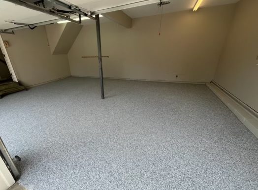 Our crew applied 1/4” Citadel Polyurea Chip System to the garage floor.