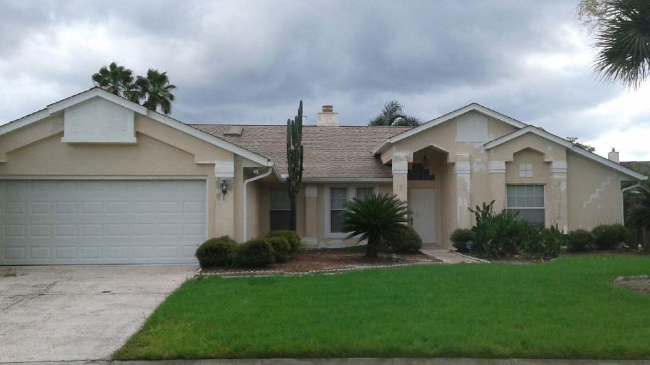 before photo of repainted house in orlando width=