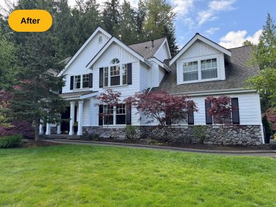 front exterior of white home after painting