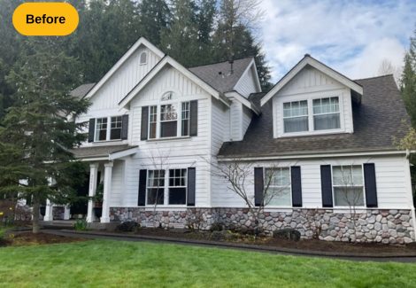 front exterior of white home before painting