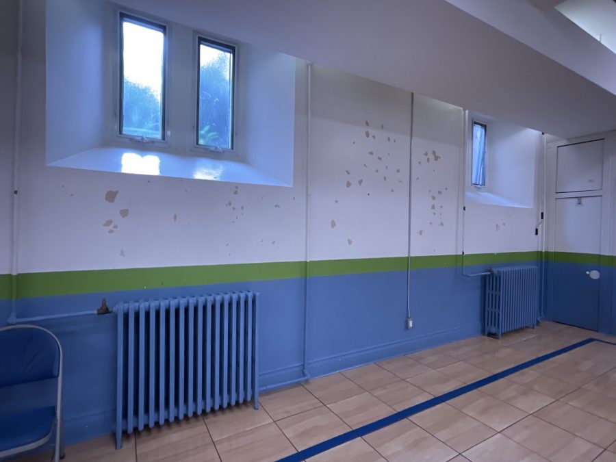 blue radiator in school gym with faded paint Preview Image 17