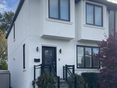 white stucco house exterior after repaint