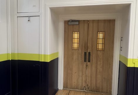 doors inside school gym after repainting project