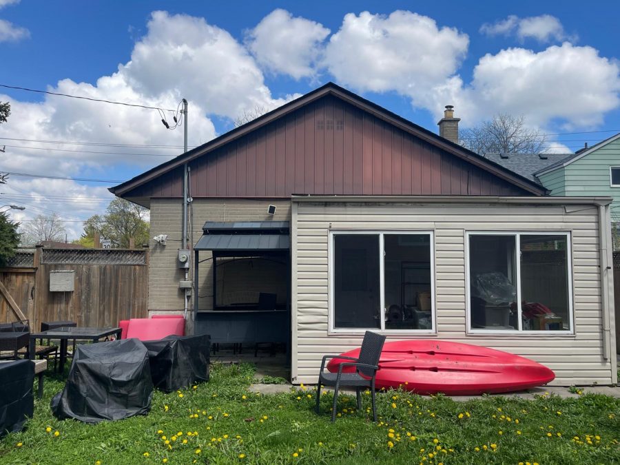 rear side of house with kayak leaning against siding Preview Image 2