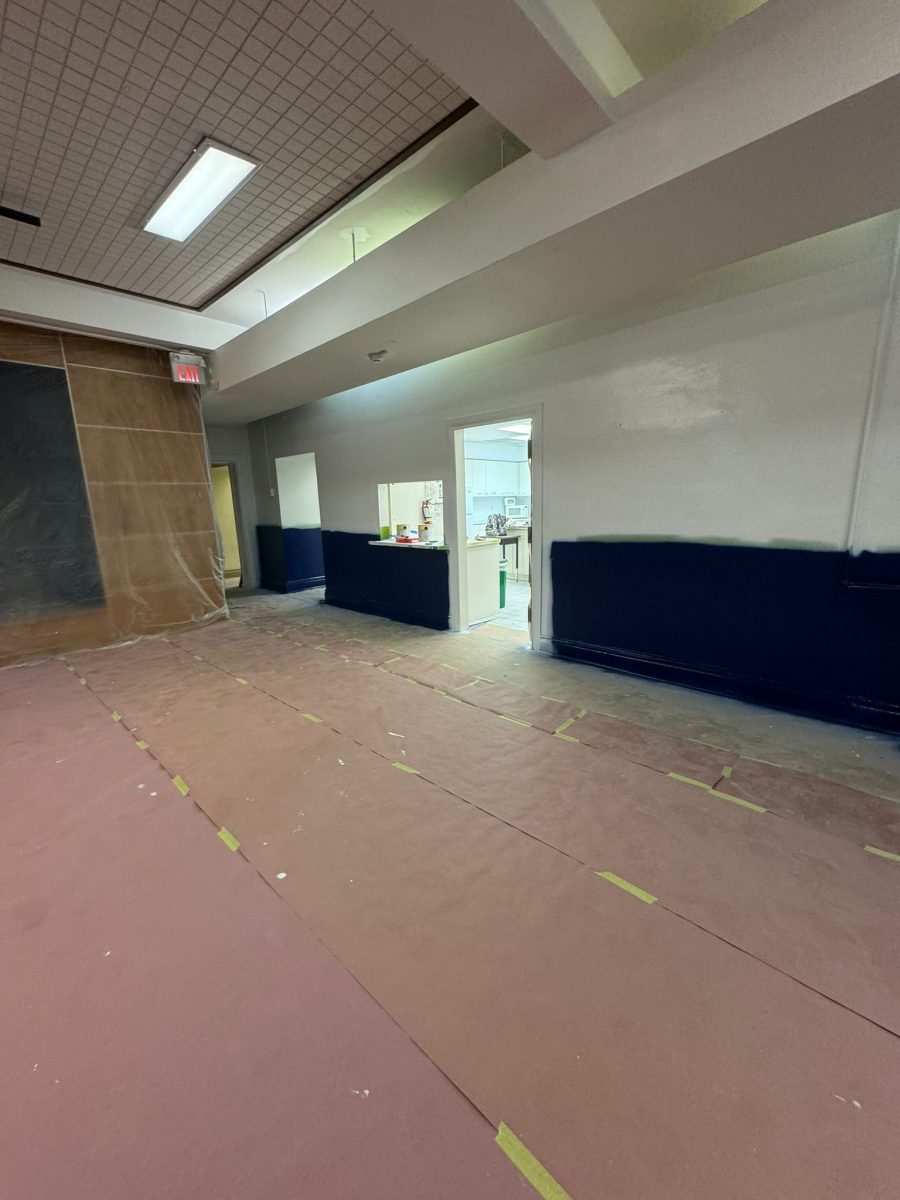 school gym flooring covered in paper for wall paint update Preview Image 9