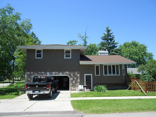 Exterior painting by CertaPro house painters in Oshkosh, WI