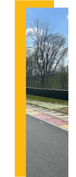 CertaPro painting the two metal crash walls at Road America