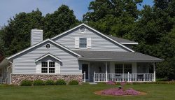 Gray Siding with White Trimwork and White Shutters