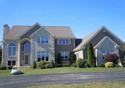 Exterior House Painting Stone Wood Siding and White Trim