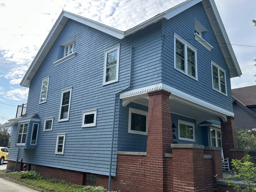 side of house with blue painted cedar shake siding Preview Image 1