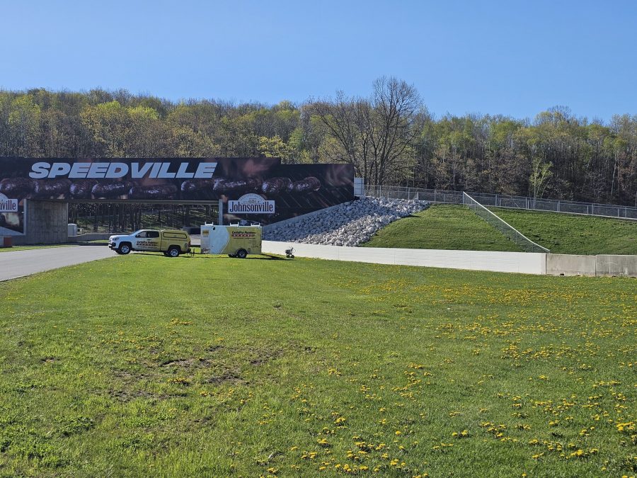 CertaPro painting the two metal crash walls at Road America Preview Image 4