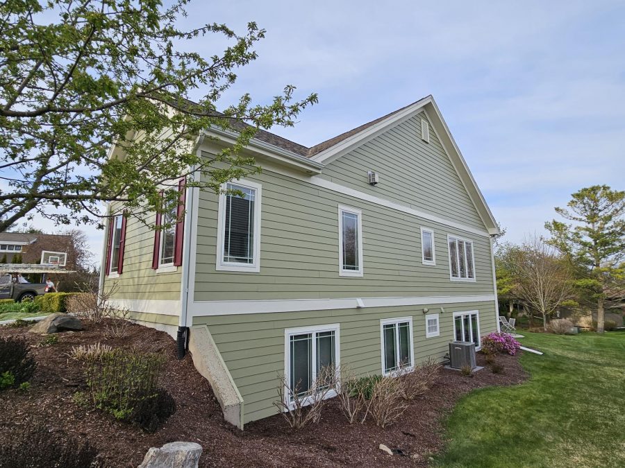 Siding, trim and shutters painted on exterior home in Kohler, WI Preview Image 1