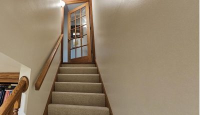 Ceiling and wall painting in basement with stairwell