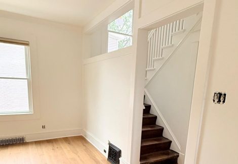 painted home interior room with wood floors