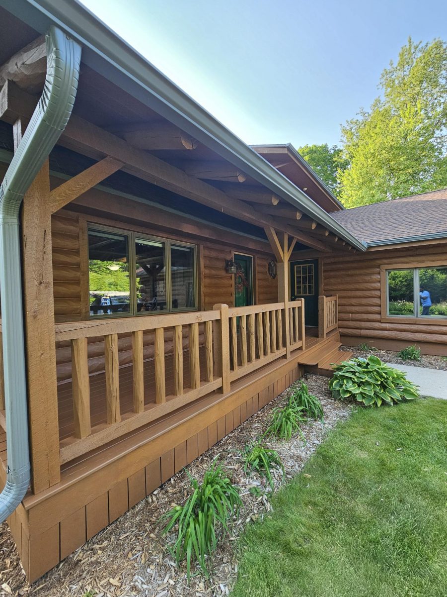 stained log home and front porch