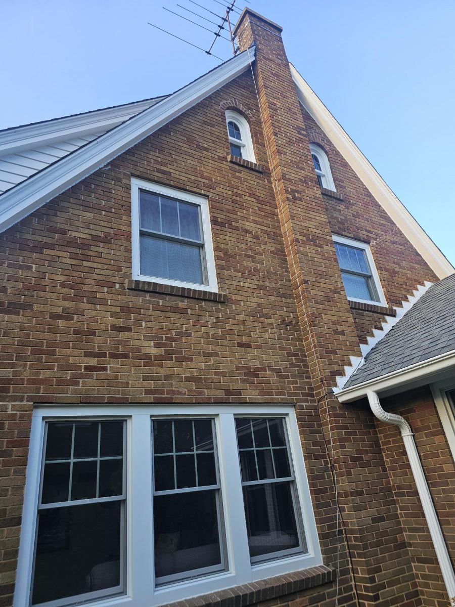 brick home with white painted window frames and trim Preview Image 4