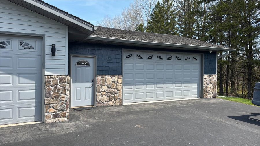 front of painted ranch style home